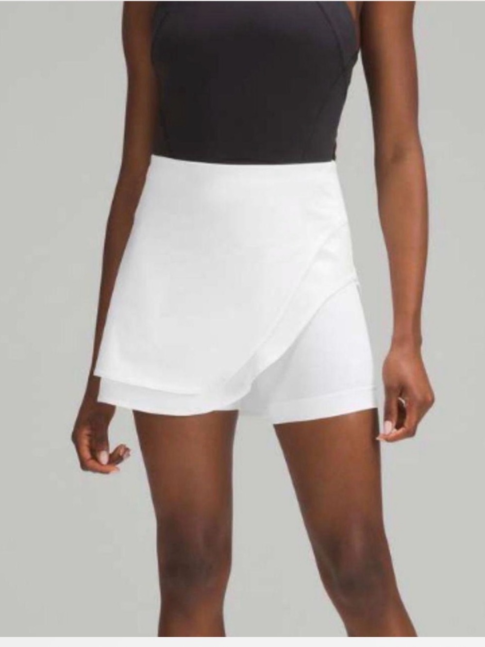 Lululemon Asymmetrical
Layered High-Rise Tennis Skirt
Size: 0. NWOT.